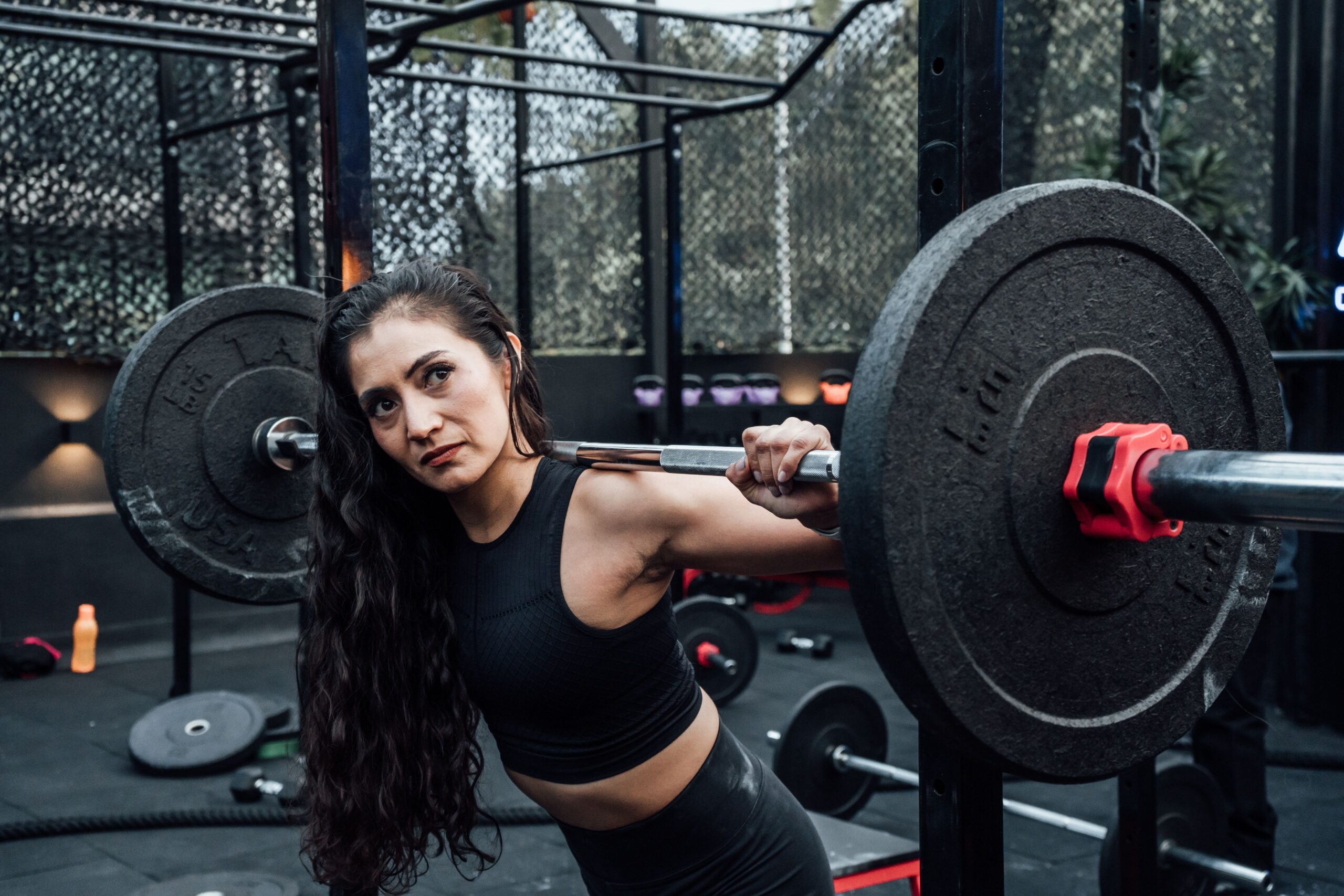Woman over 50 lifting weights.